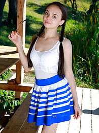 Find-Best-Lesbians.com presents: Fresh-Faced russian beauty Mia Grandy gets totally naked on a picnic table in a garden